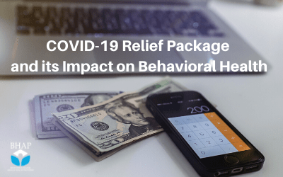 a laptop with a stack of money and a cell phone with the calculator app up. 'COVID-19 Relief Package and its Impact on Behavioral Health'