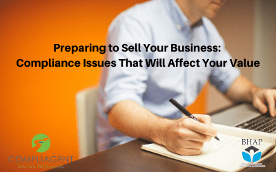a man at a desk with laptop and notepad, 'Preparing to Sell Your Business: Compliance Issues That Will Affect Your Value'
